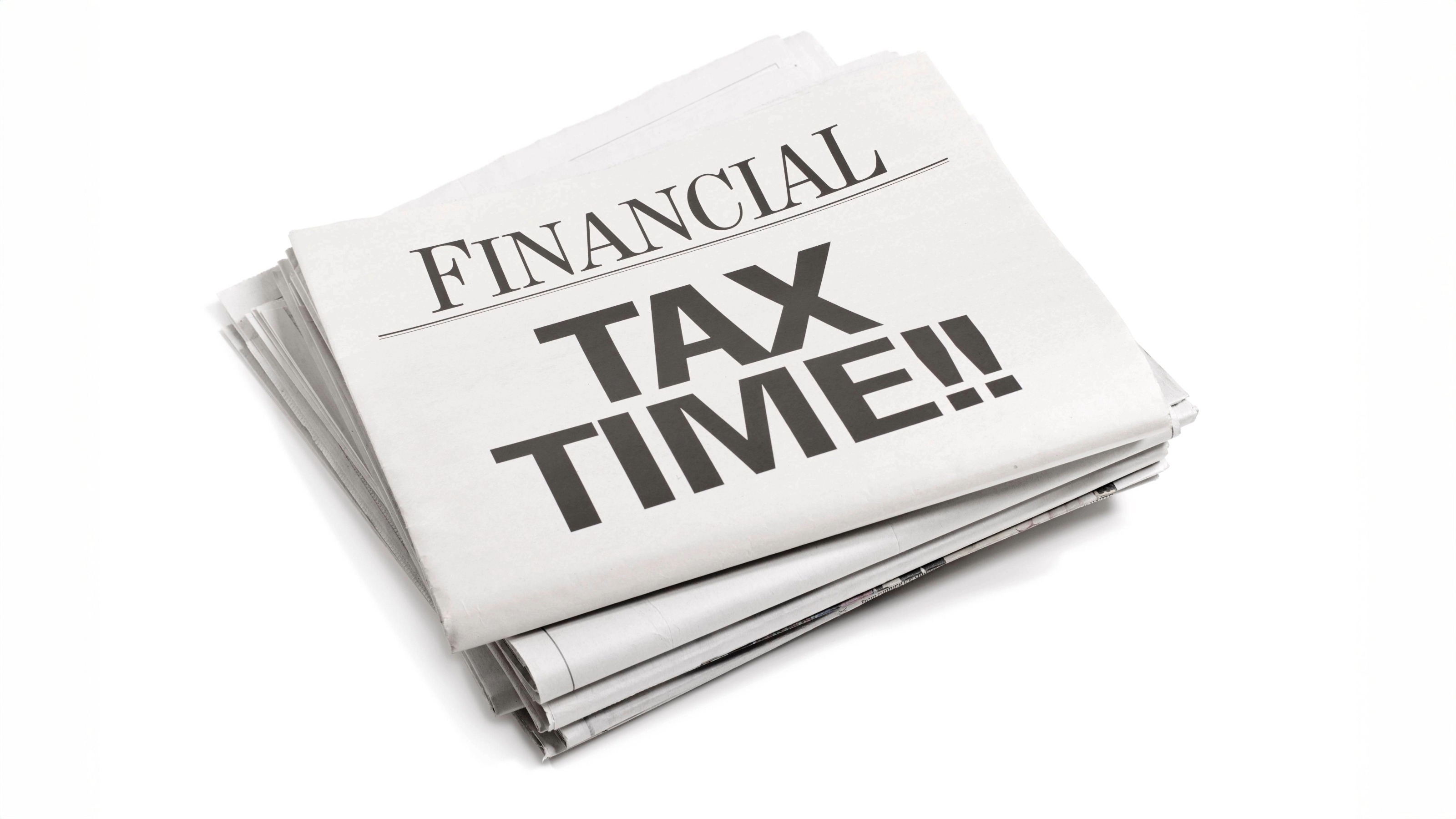 A stack of financial newspapers highlighting tax time and filing urgency.