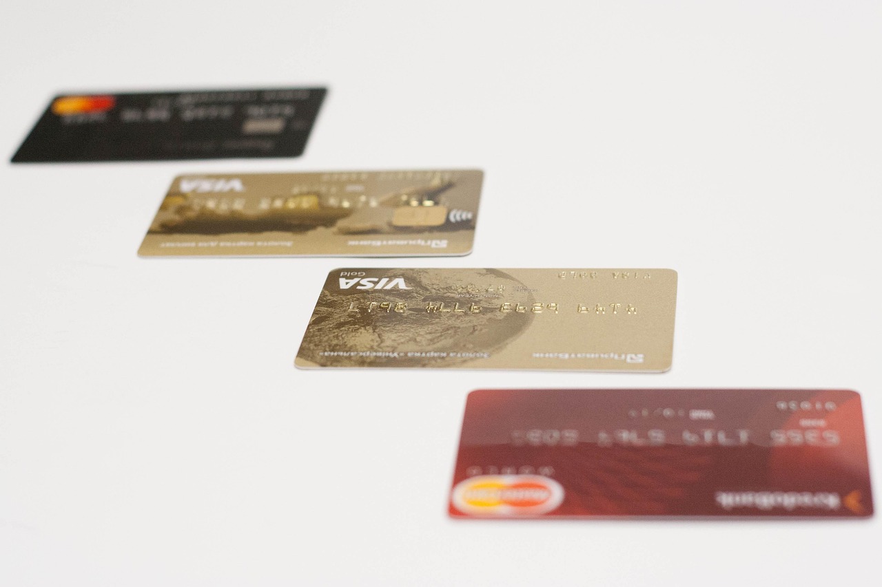 Elegant gold credit card placed on a premium surface representing flexible rewards currency