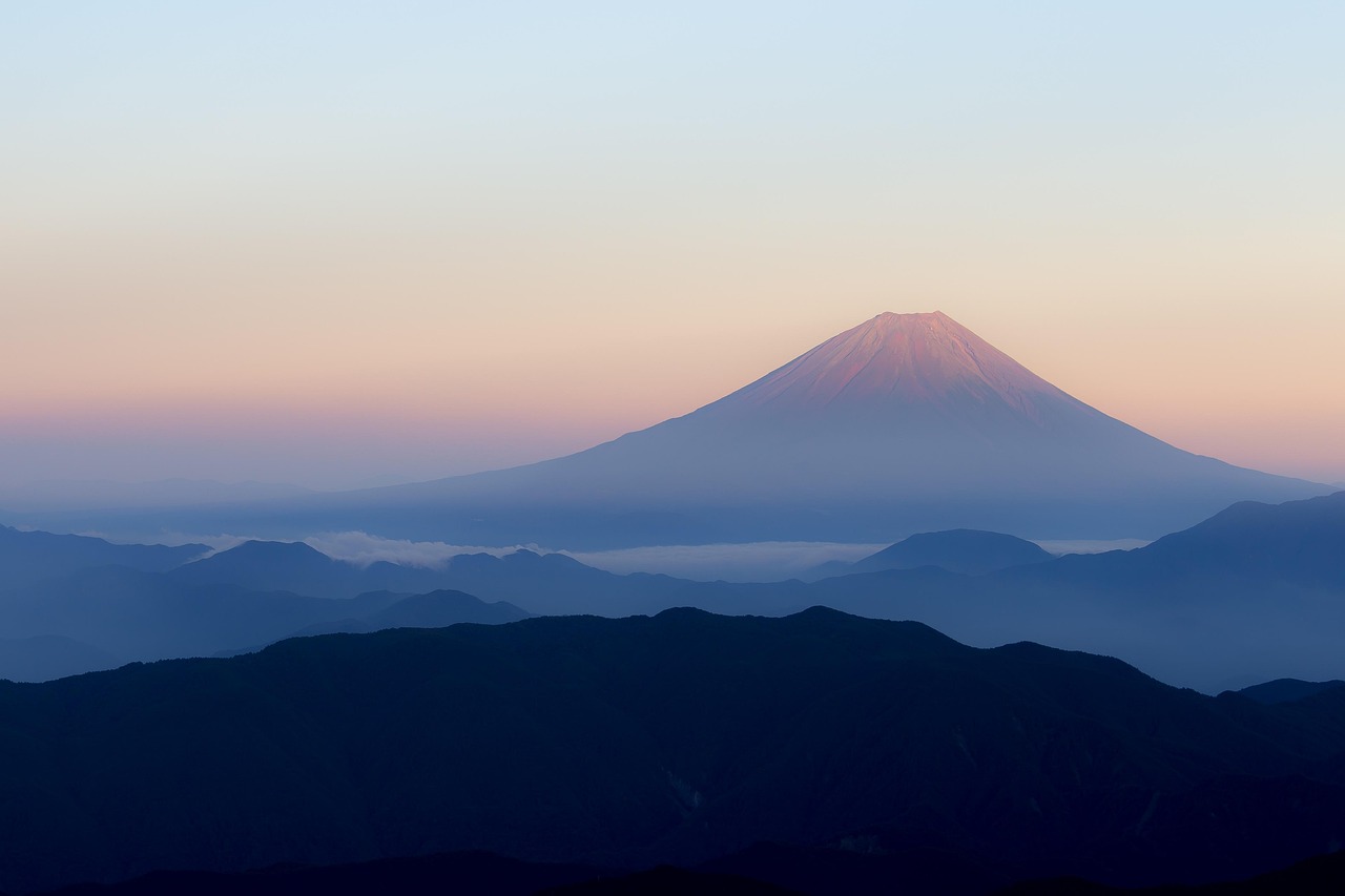 Aerial view of Mount Fuji from a flight cabin window