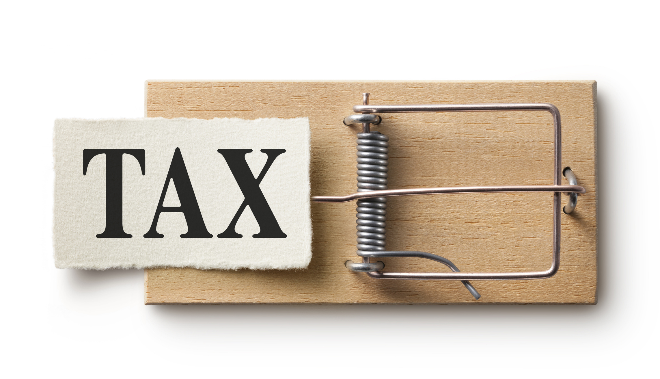 Symbolic representation of a tax trap showing a paper marked 'tax' placed on a spring-loaded mousetrap.