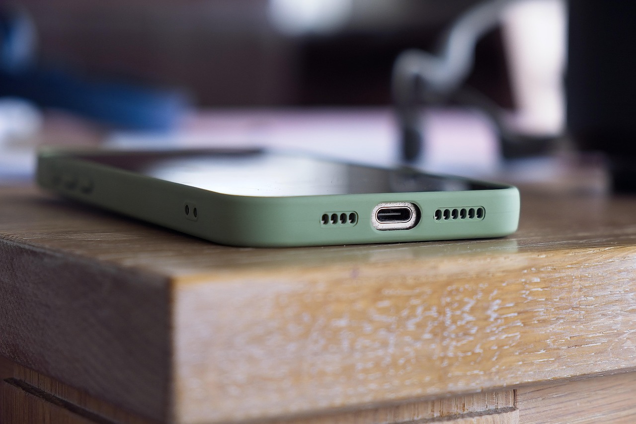 Modern smartphone displaying a biometric security fingerprint scan.