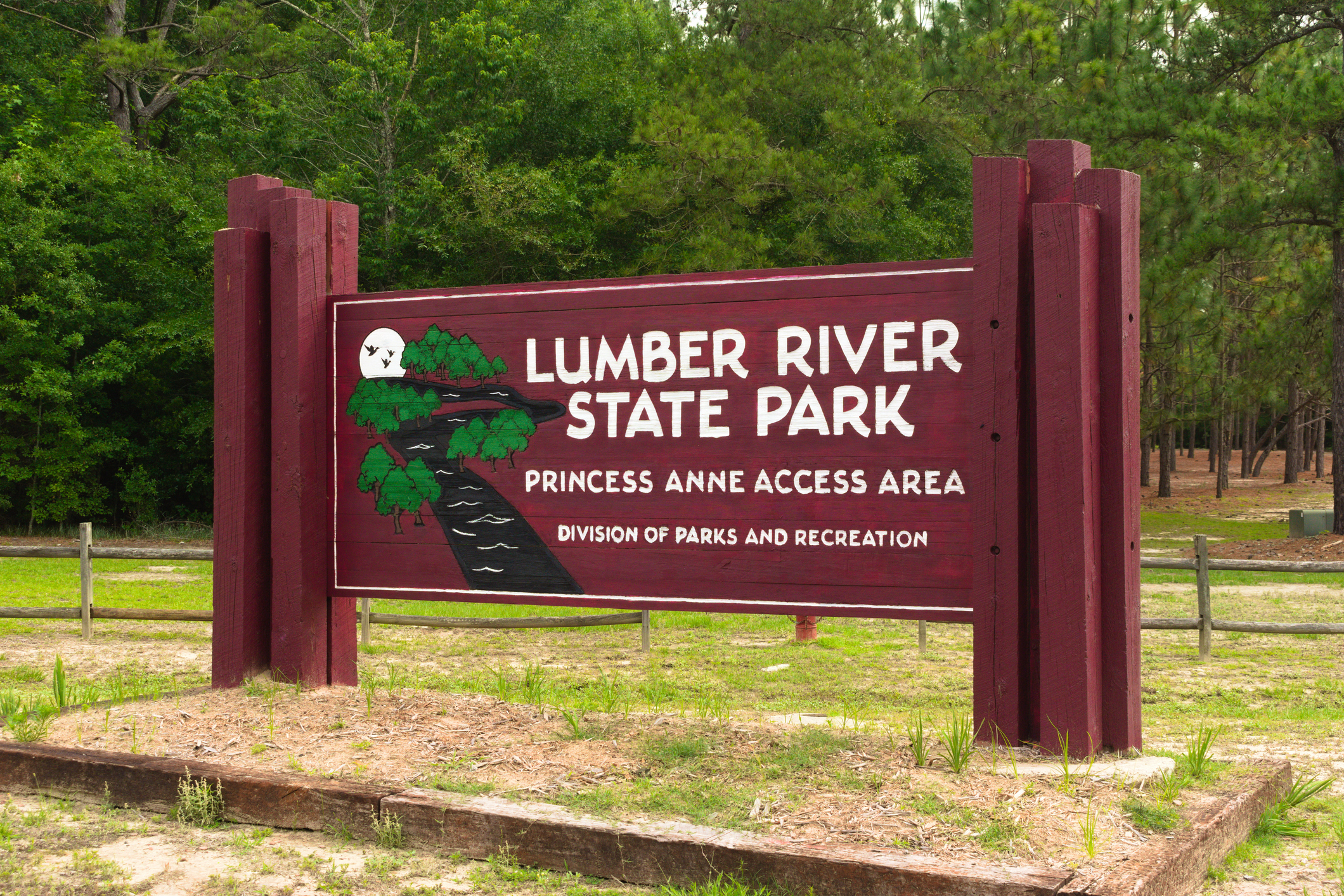 The wooden entrance sign to Lumber River State Park in North Carolina.