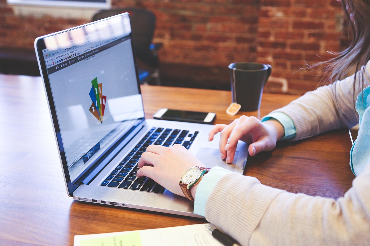 professional workspace with a laptop used for secure digital messaging