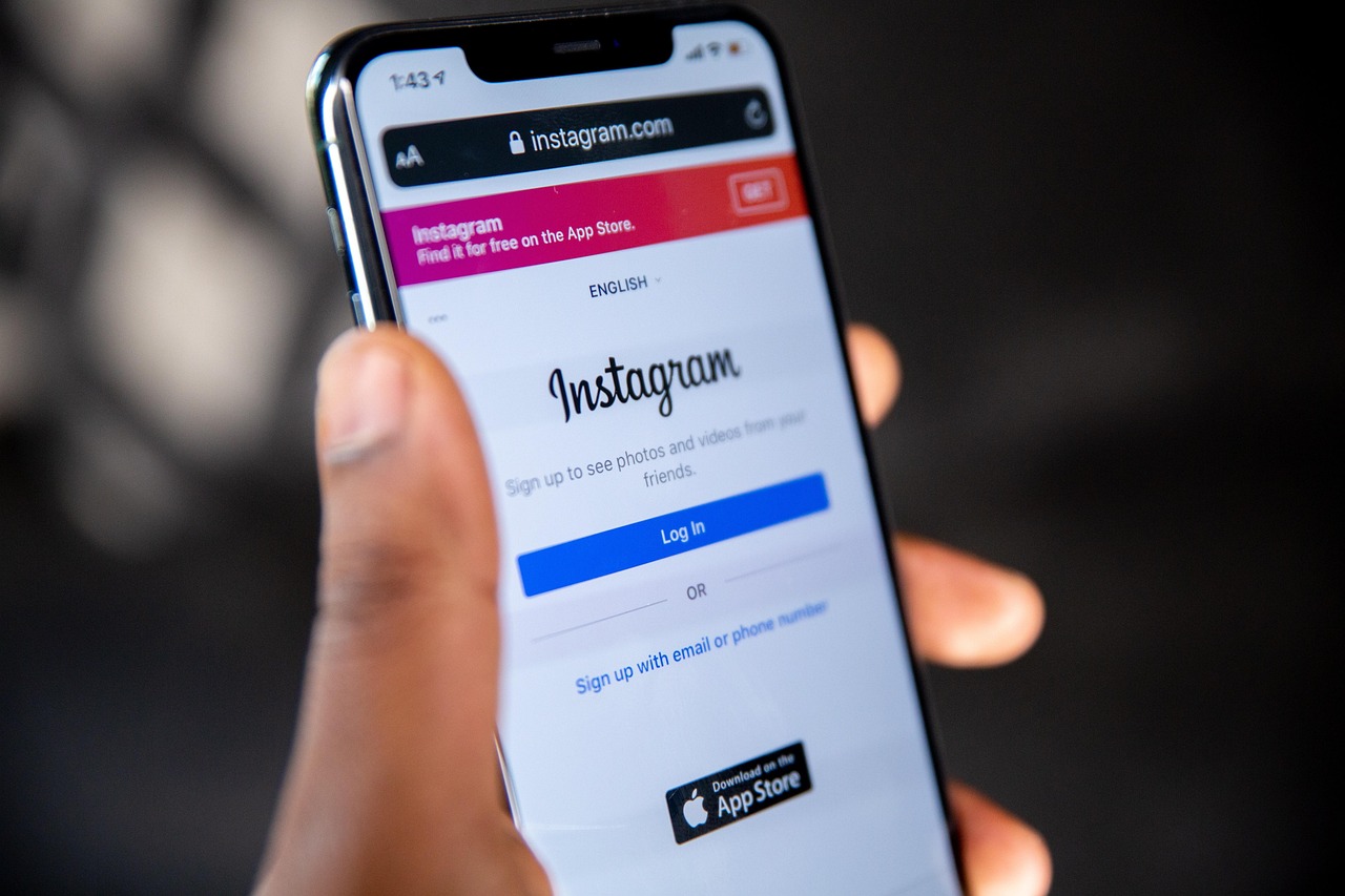 close up of a hand scrolling through a financial application on a smartphone